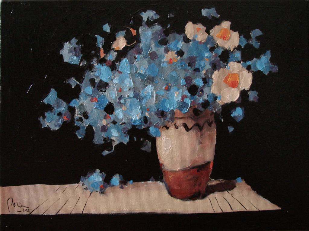 Poza Cana cu flori de albastrele