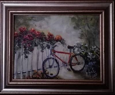 Poza O bicicleta intre flori